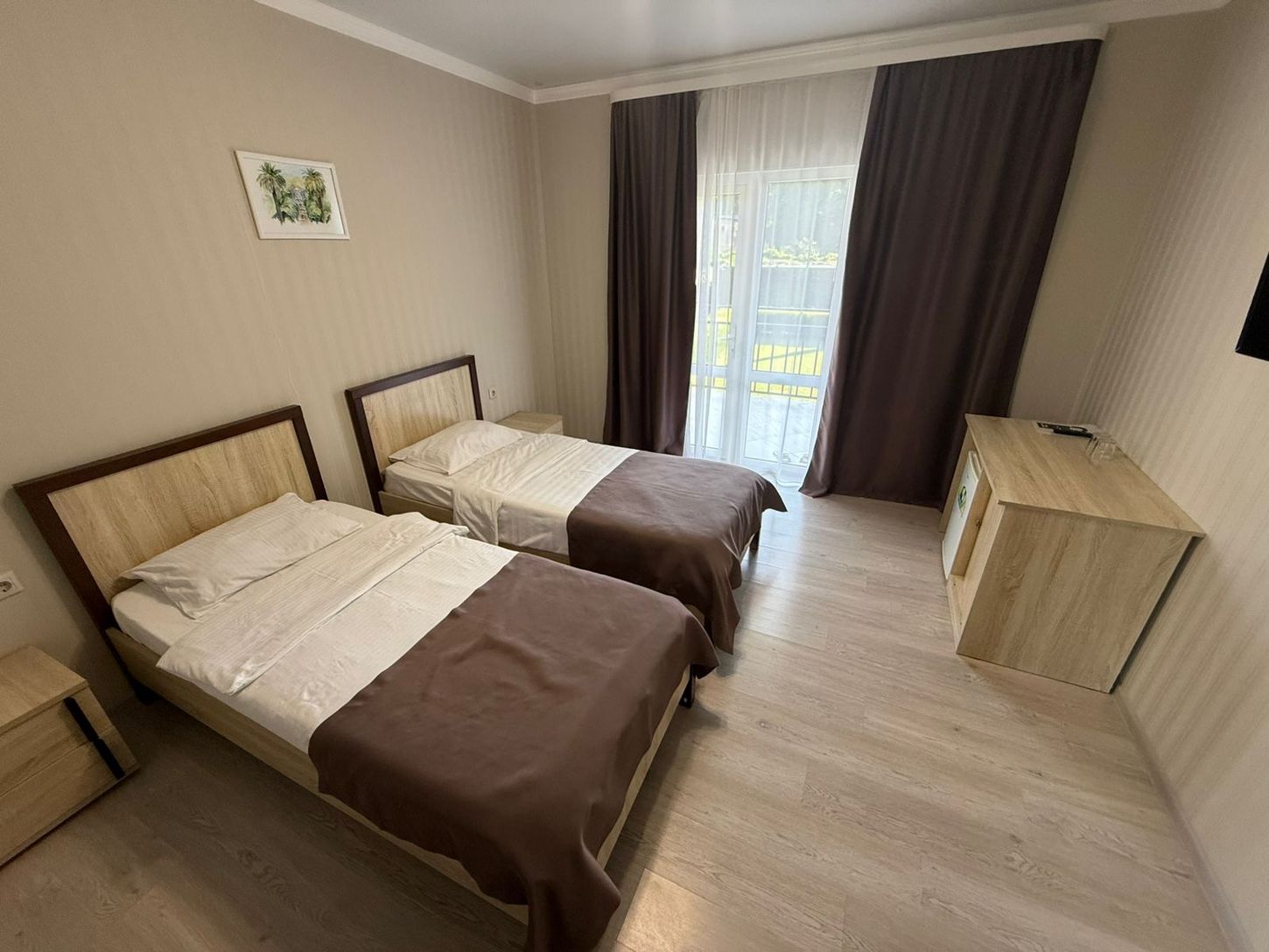 Просторный двухместный номер с 2 отдельными кроватями