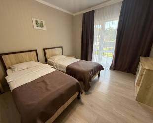 Просторный двухместный номер с 2 отдельными кроватями